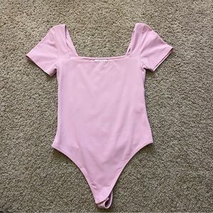 Aritzia Babaton Bubblegum pink bodysuit